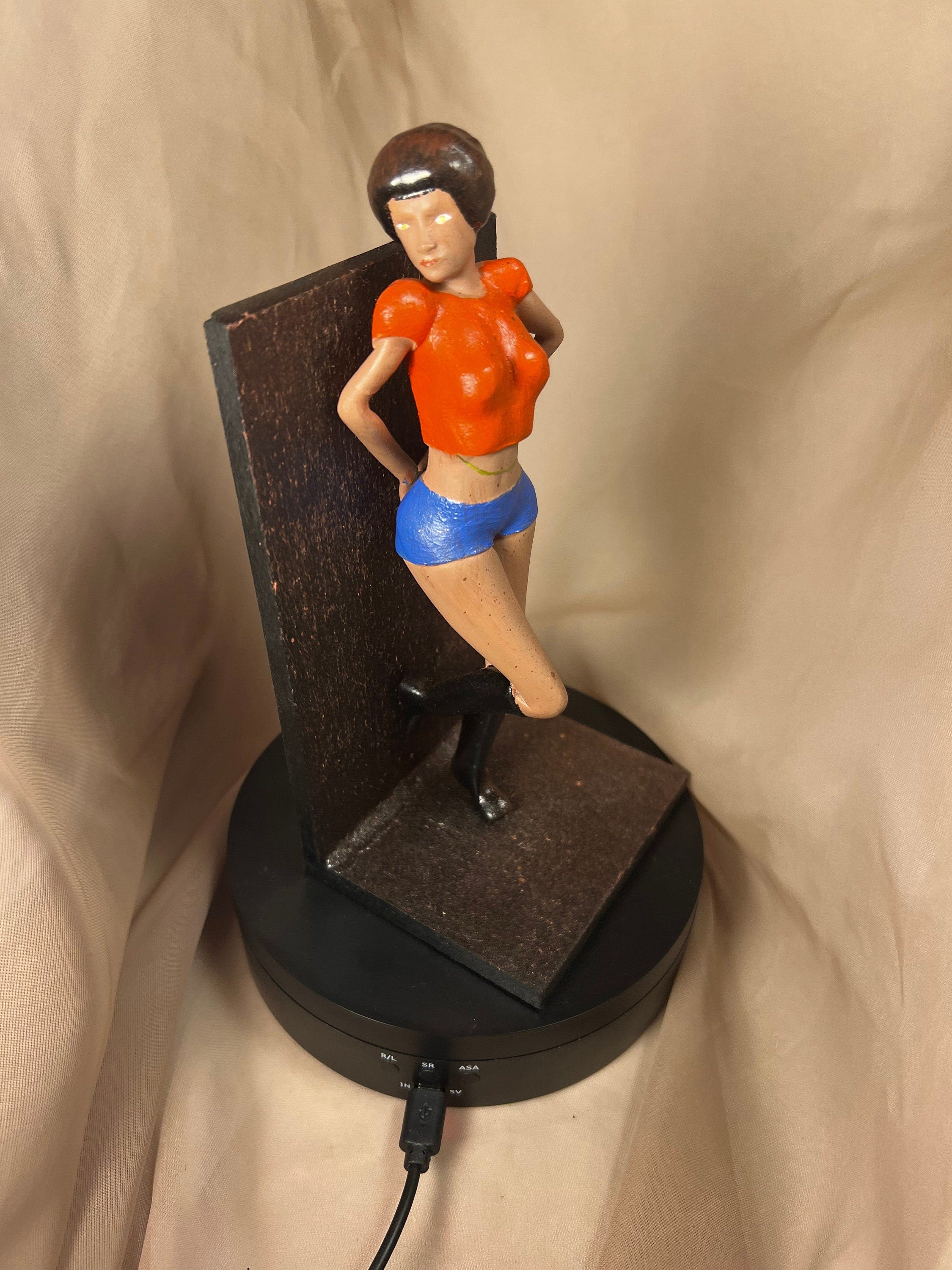 Woman Leaning on Wall