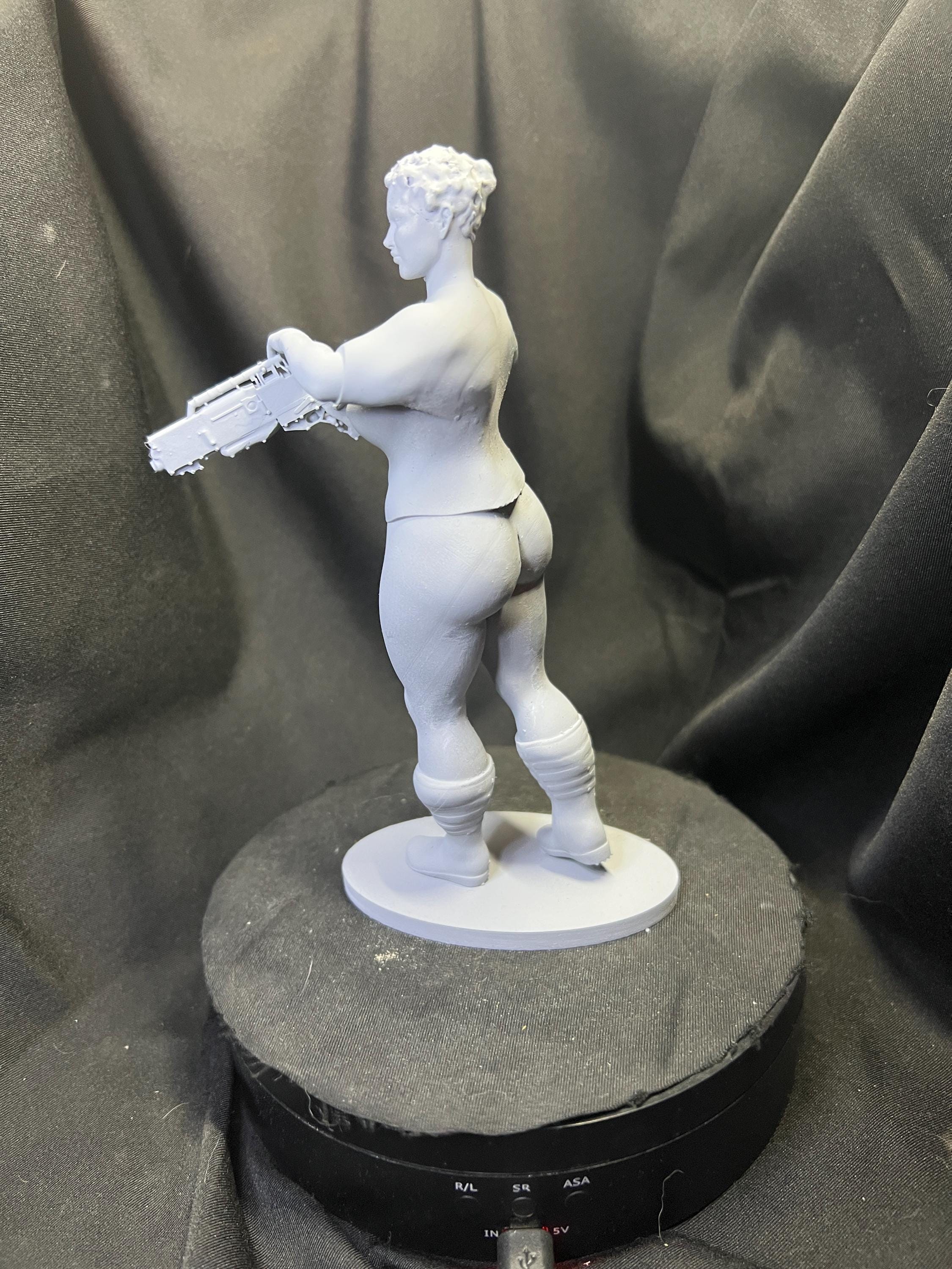 Futuristic Fighter Woman with Blaster Rifle