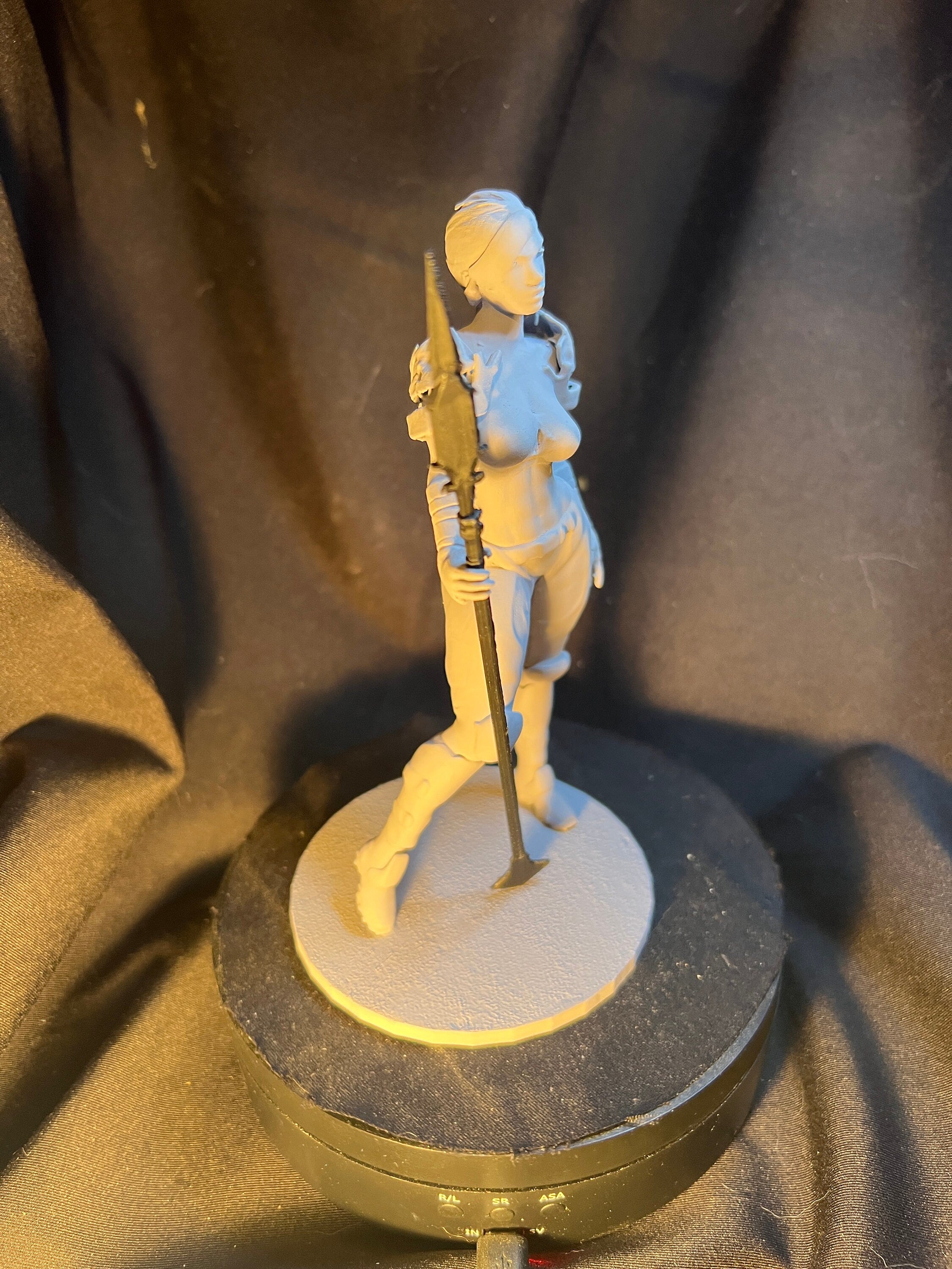 Spear-Wielding Woman with Armor