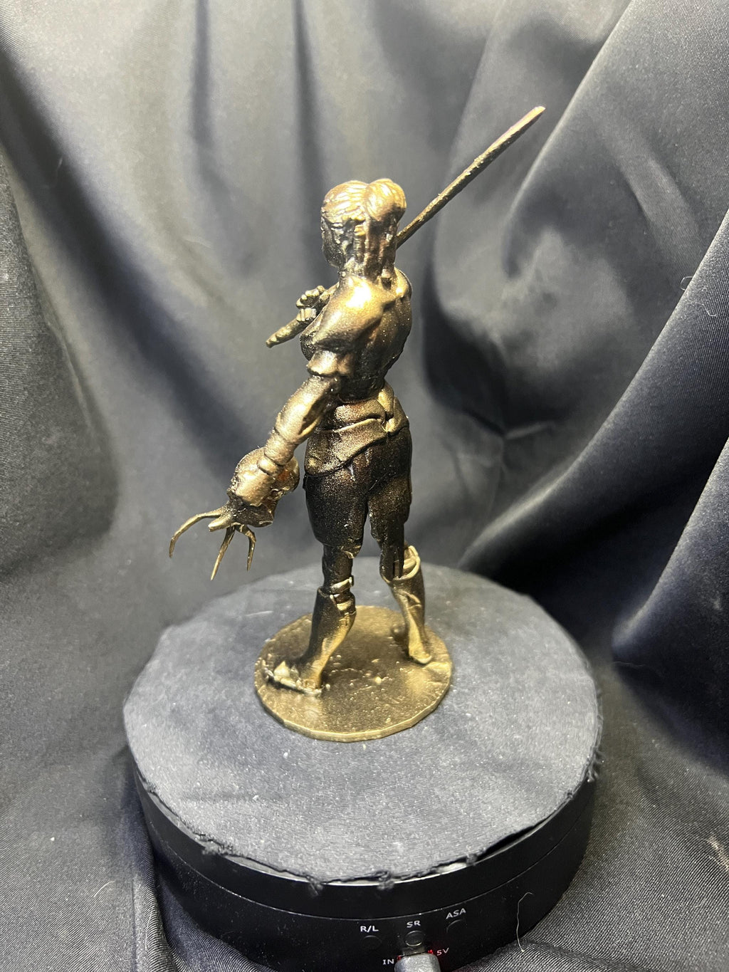 Lae'zel Holding a Mindflayer Head Figure