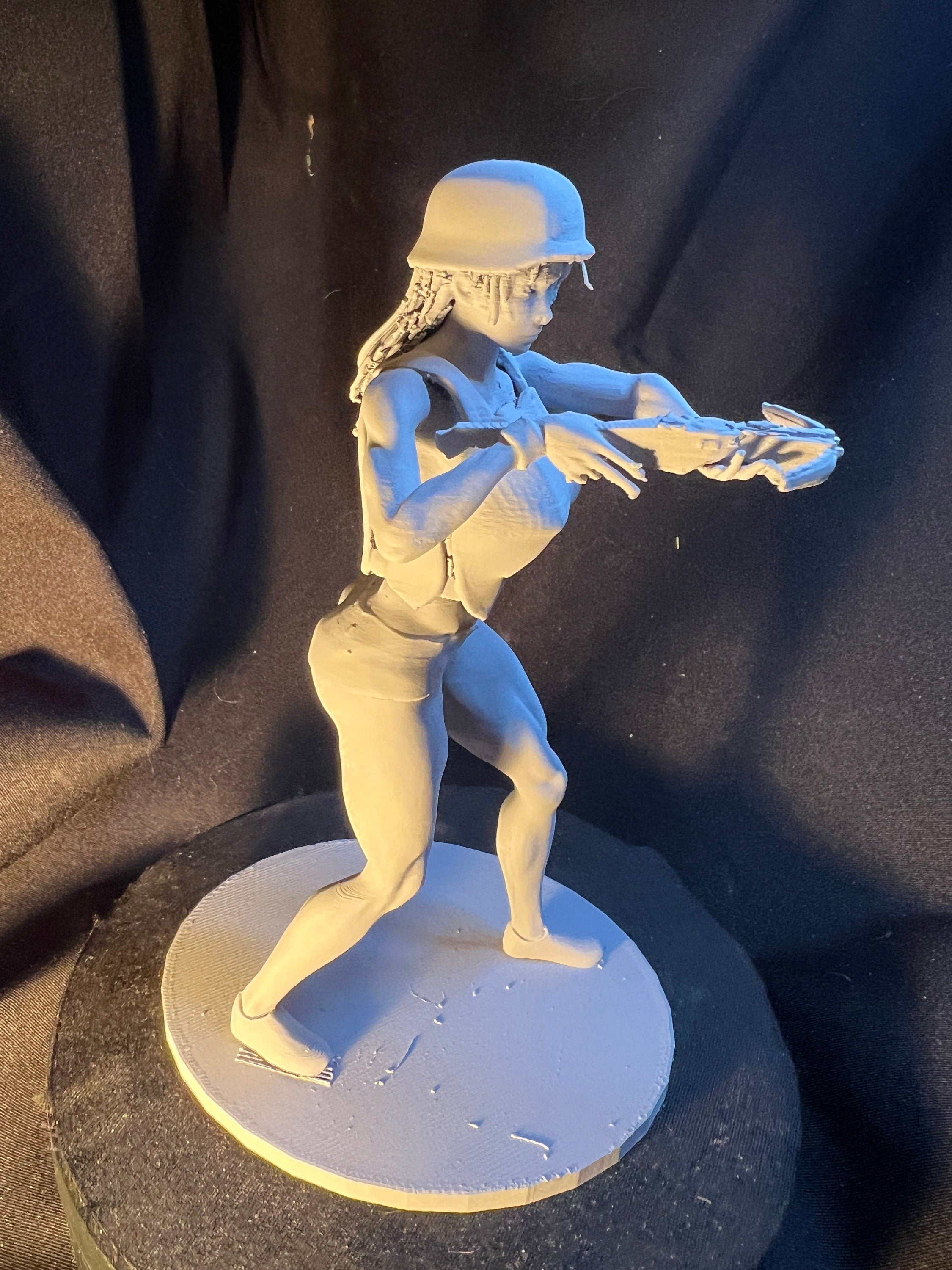 Crossbow-Wielding Woman Figure / Armored Female Fighter