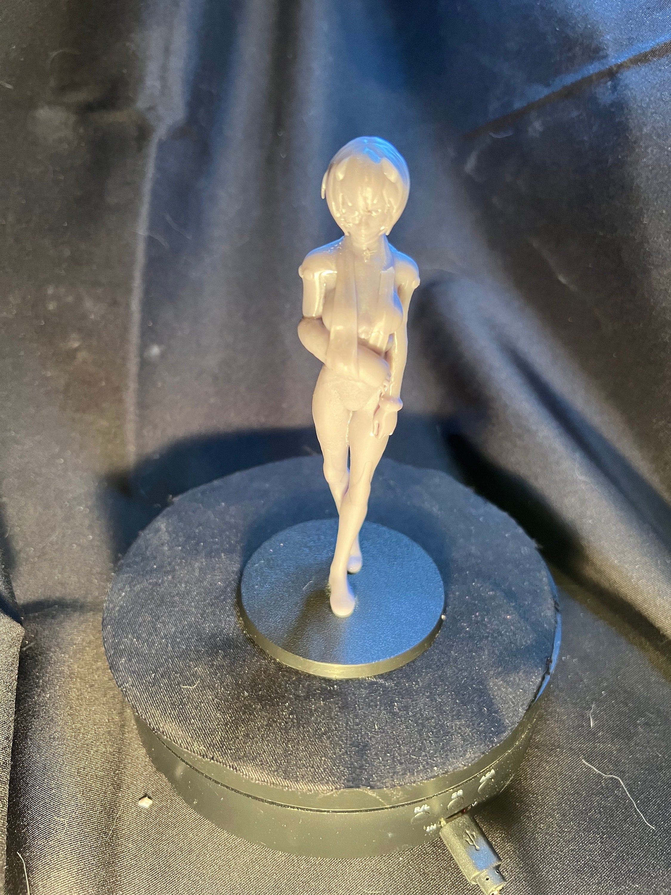 Injured Anime Woman Figurine