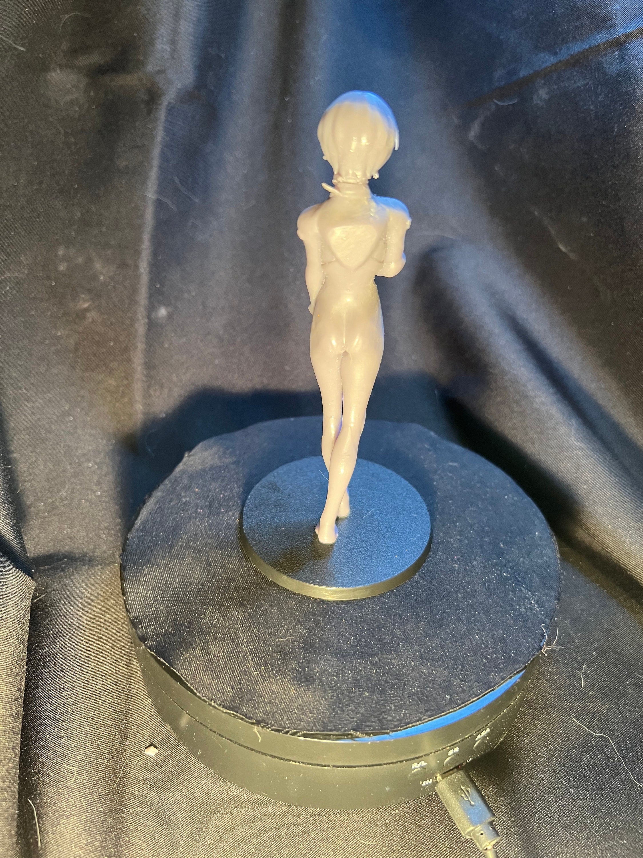 Injured Anime Woman Figurine