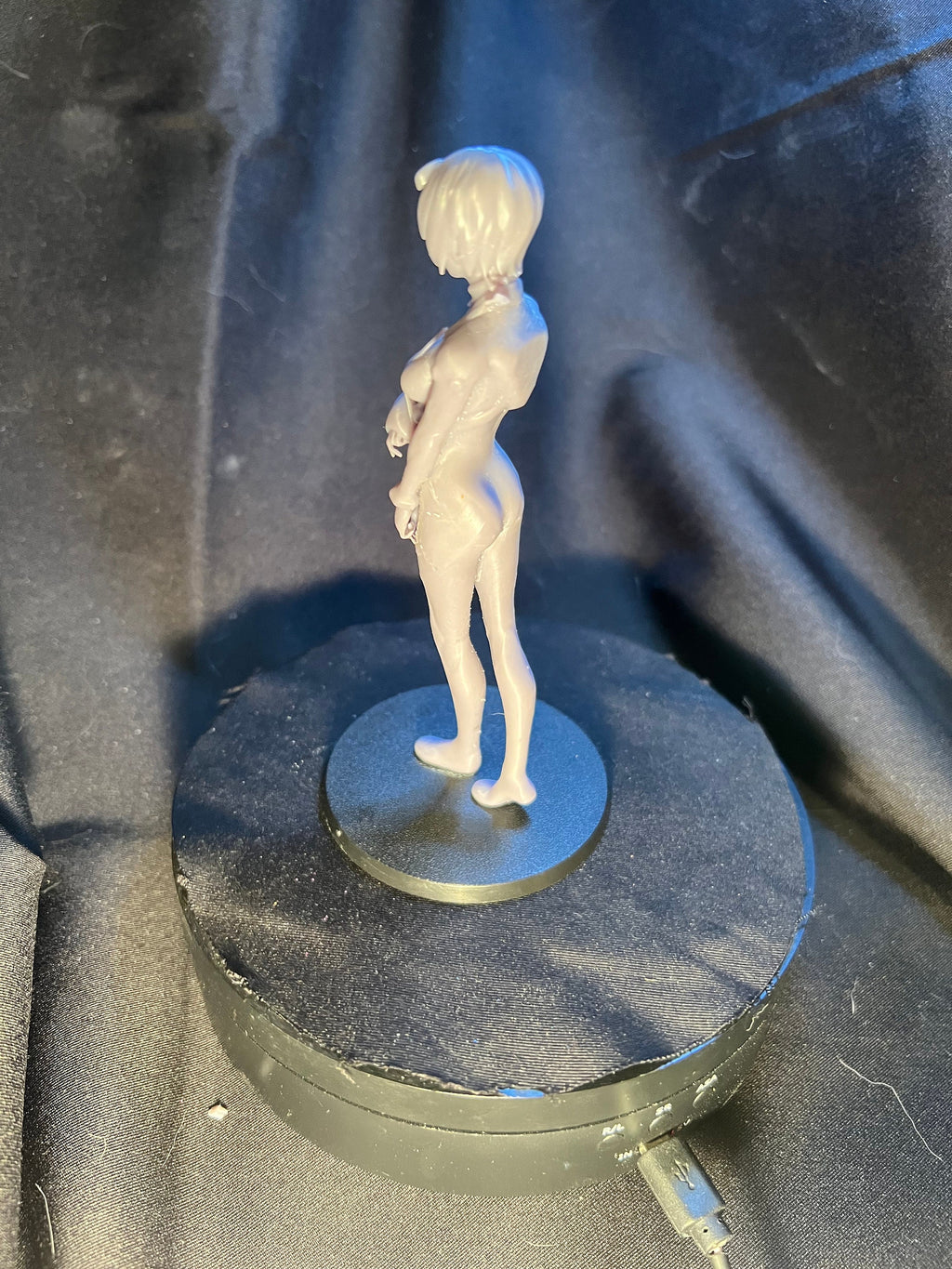 Injured Anime Woman Figurine