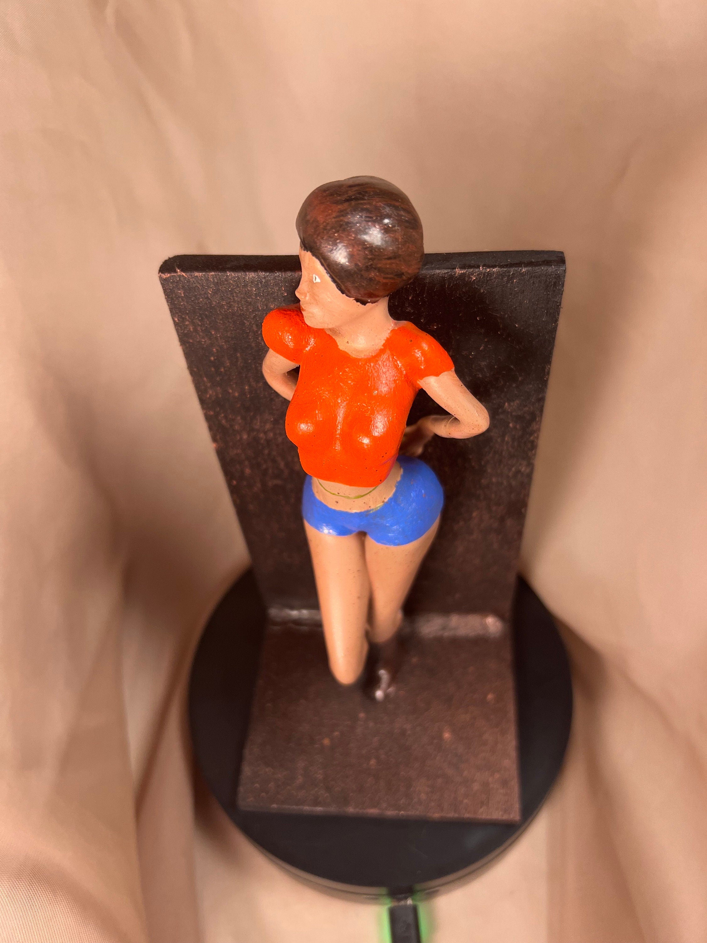 Woman Leaning on Wall