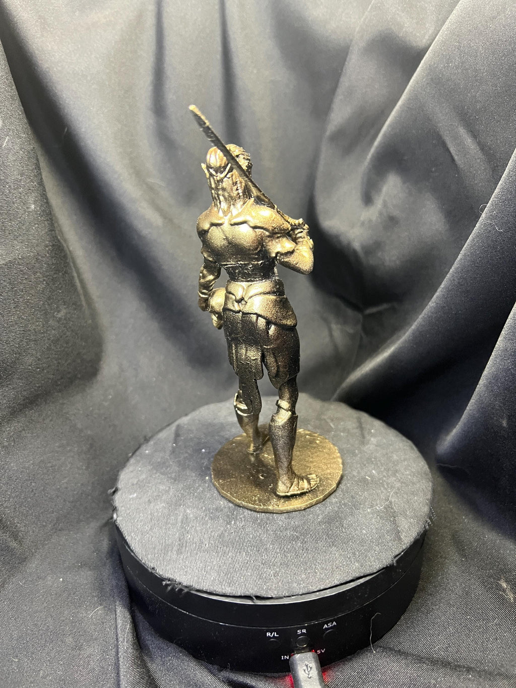 Lae'zel Holding a Mindflayer Head Figure
