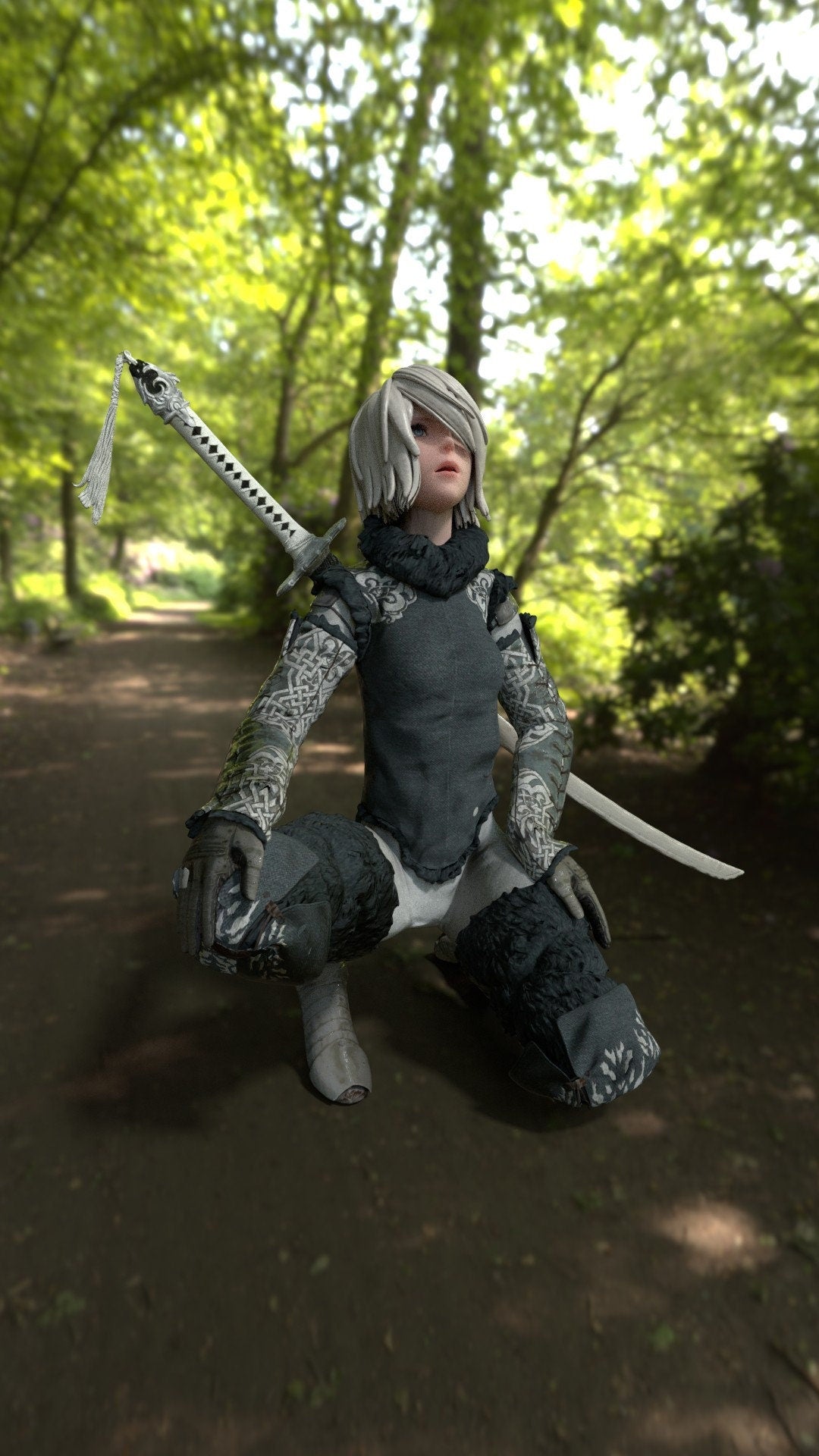 Kneeling Woman Warrior with a Sword