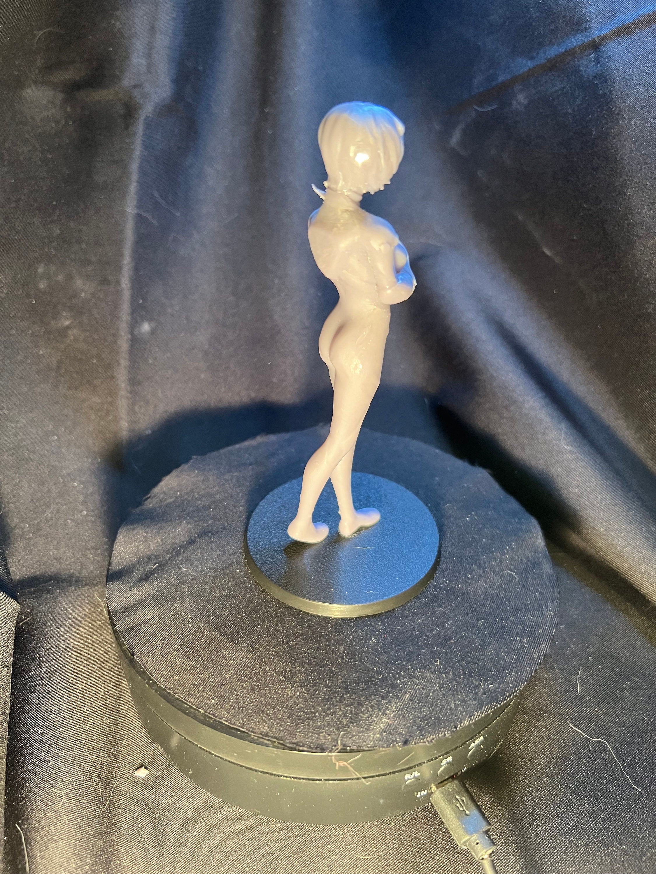 Injured Anime Woman Figurine