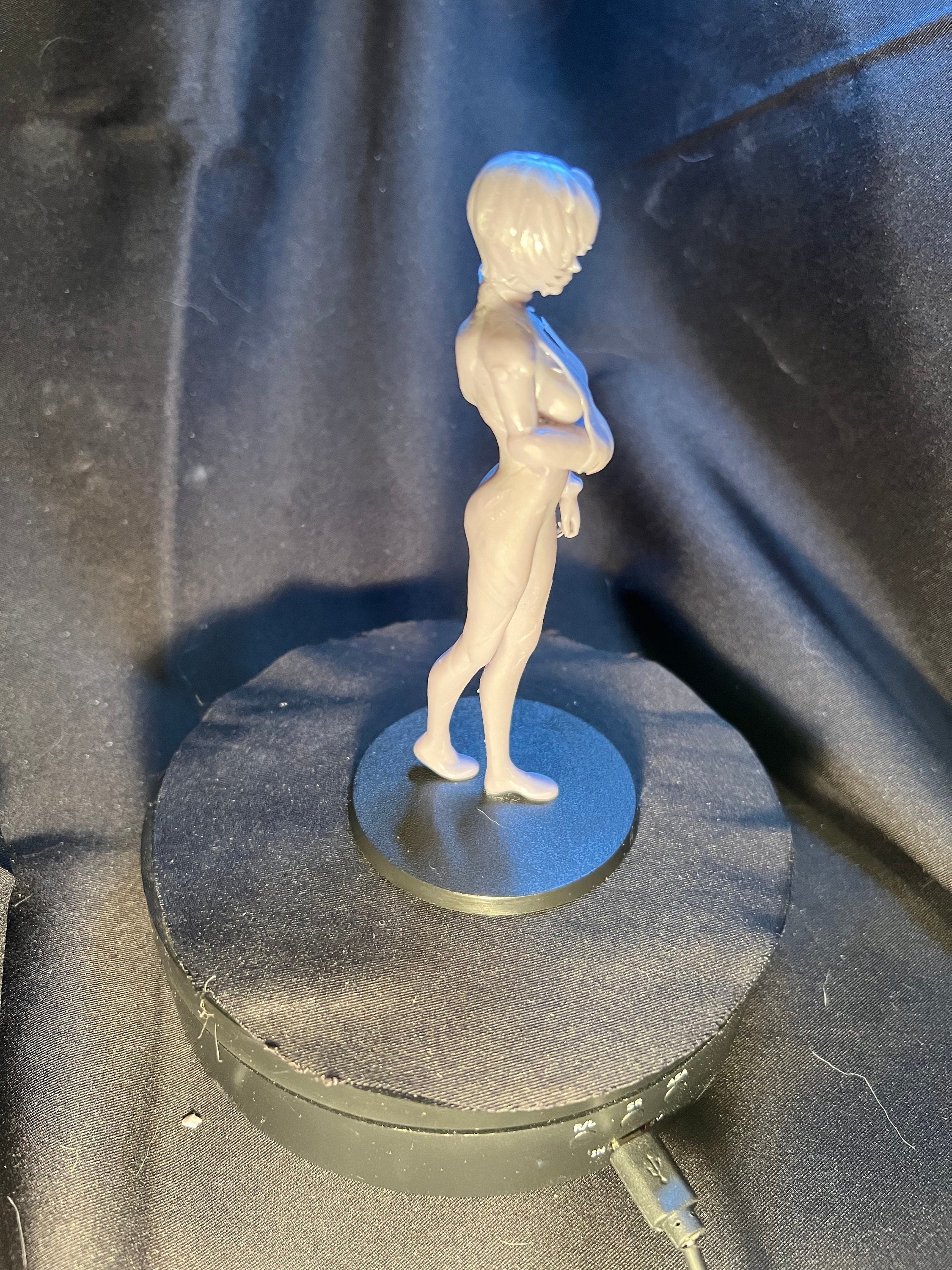 Injured Anime Woman Figurine